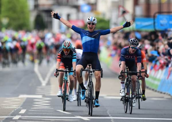 Harry Tanfield celebrates winning a stage in last year's Tour de Yorkshire.
