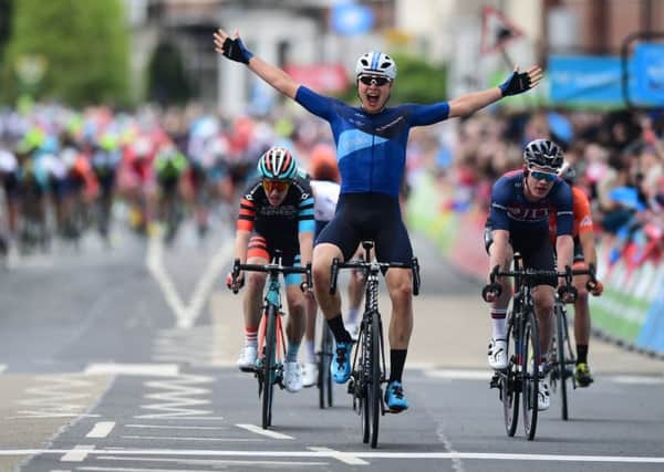 Harry Tansfield celebrates last year's Tour de Yorkshire stage win in Doncaster, the town which hosts the start of this year's race.