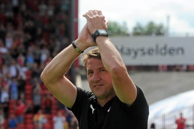 Daniel Stendel salutes the fans on the opening day against Oxford, a 4-0 rout that set the scene.