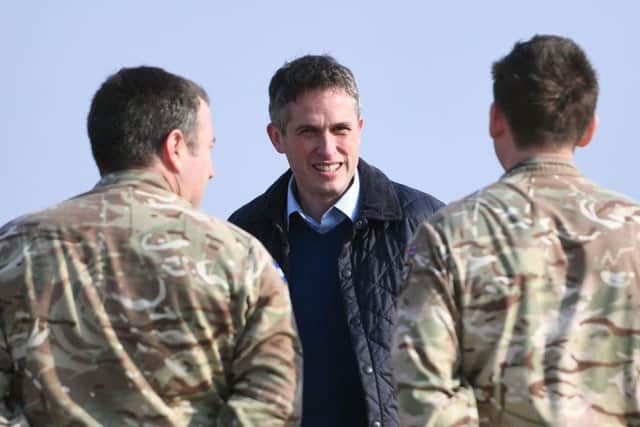 Gavin Williamson, the former Defence Secretary, with members of the Armed Forces.