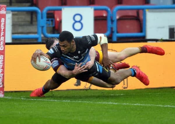 Hull's Ratu Naulago goes over the tryline.
