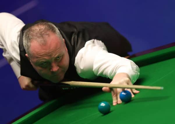 John Higgins in action against David Gilbert during day 13 of the 2019 Betfred World Championship at the Crucible, Sheffield (Picture: Simon Cooper/PA Wire).