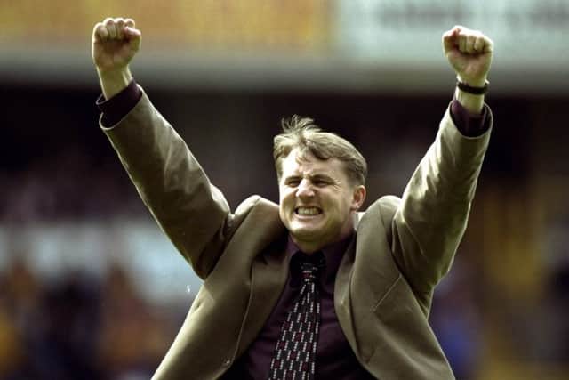 Bradford City manager Paul Jewell celebrates promotion to the FA Carling Premier League (Picture: Ross Kinnaird /Allsport)
