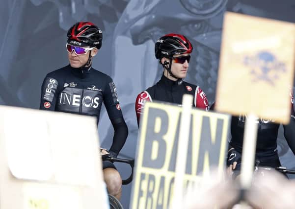 Chris Froome (left) faces protests at the start of the Tour de Yorkshire about the involvement of Ineos in his cycling team.