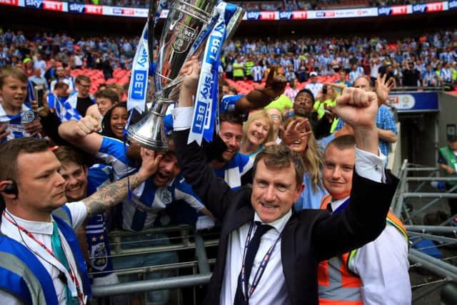 Huddersfield Town chairman Dean Hoyle with the trophy after winning the Sky Bet Championship play-off final at Wembley Stadium. Picture: PA