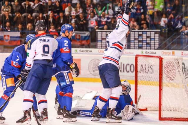 GET IN: Robert Farmer celebrates his goal against Slovakia in Poprad on Saturday afternoon. Picture: Andrej Galica.