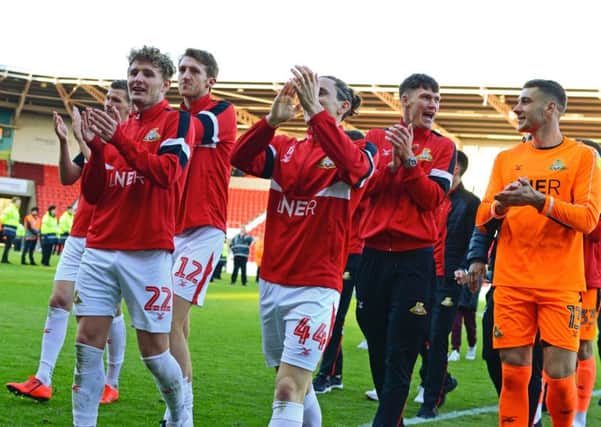 Doncaster Rovers players celebrate their win. (Picture: Marie Caley)