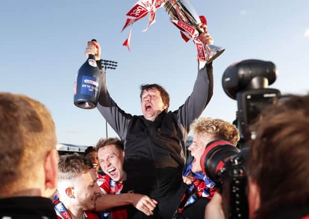 Going up: Barnsley head coach Daniel Stendel celebrates promotion.