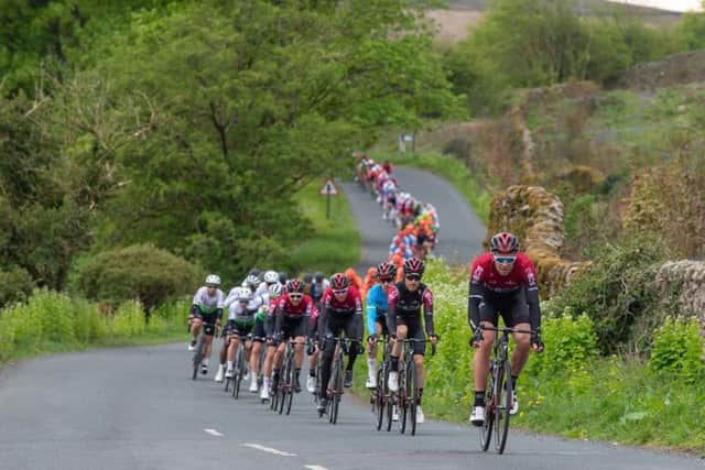Team Ineos lead the peloton through Barden Tower in Wharfedale on the fourth stage of the Tour de Yorkshire.
