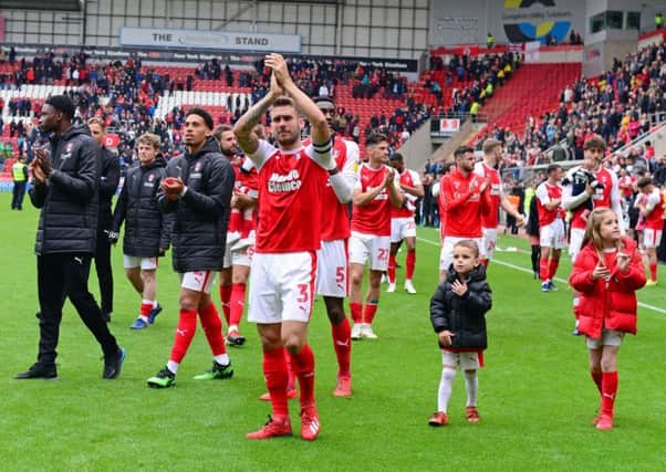 Rotherham United players walk a lap of the field to applaud their fans after the match with Middlesbrough (Picture: Marie Caley).