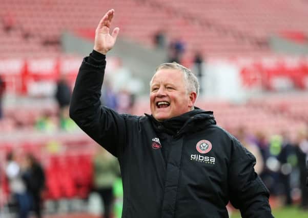 Chris Wilder of Sheffield United celebrates in front of the travelling fans at Stoke (Picture: James Wilson/Sportimage)