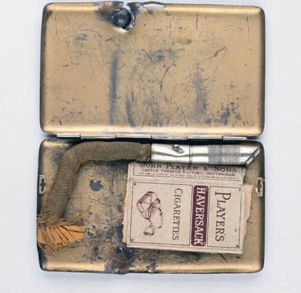 Bert Drury's cigarette case with shrapnel. Picture: Doncaster 1914-18