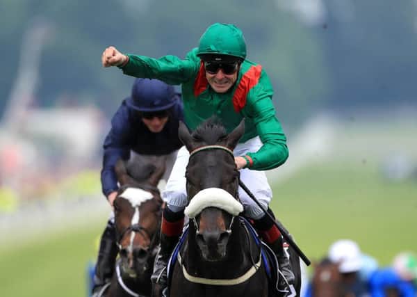 Pat Smullen, who has retired from the saddle, pictured winning the 2016 Investec Derby aboard Harzand (Picture: David Davies/PA Wire).