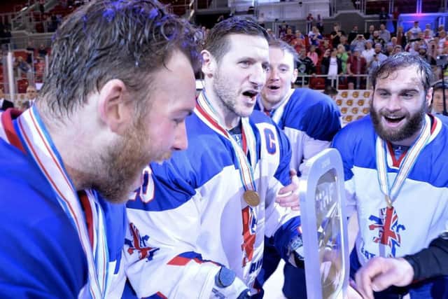 PARTY TIME: Jonathan Phillips celebrates gold in Hungary with his GB team-mates, including Ben O'Connor and Robert Farmer. Picture: Dean Woolley.