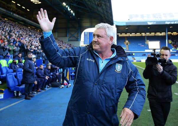 Sheffield Wednesday Steve Bruce ggreets the 'unique band' of Owls supporters at Hillsborough. Picture: Steve Ellis