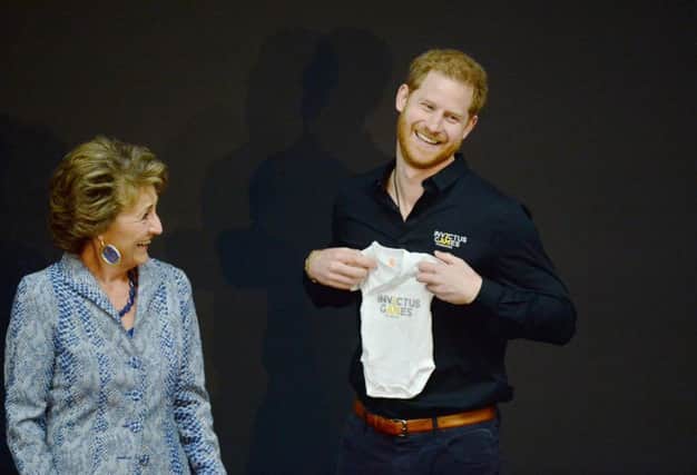 The Duke of Sussex receives a gift for his new son, Archie, from Princess Margriet of the Netherlands