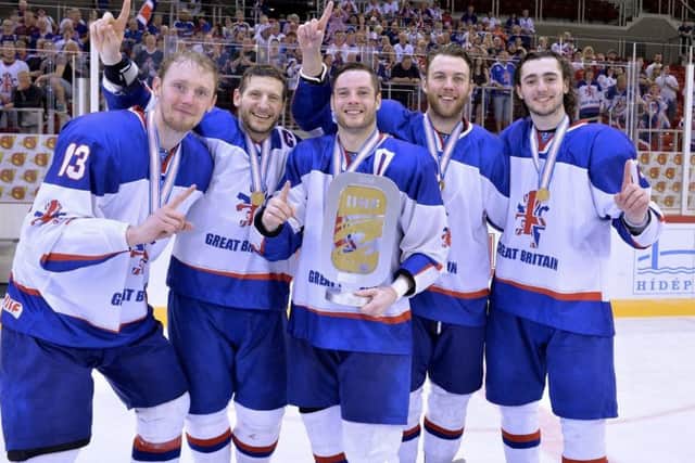 MAGIC MOMENT: Robert Dowd, centre, celebrates last year's gold medal success in Budapest with Steelers' team-mates Davey Phillips, left, Jonathan Phillips, Ben O'Connor and Liam Kirk. Picture: Dean Woolley.