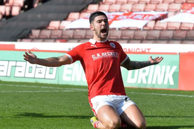 Alex Mowatt celebrates his opening goal for Barnsley against Coventry City in March (Picture: Bruce Rollinson)