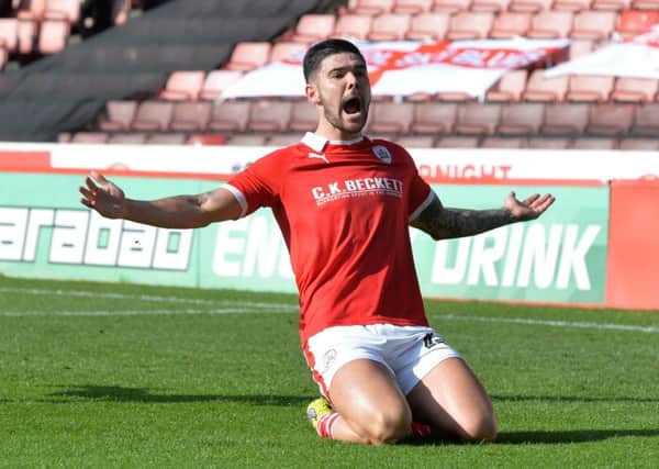 Alex Mowatt celebrates his opening goal for Barnsley against Coventry City in March (Picture: Bruce Rollinson)