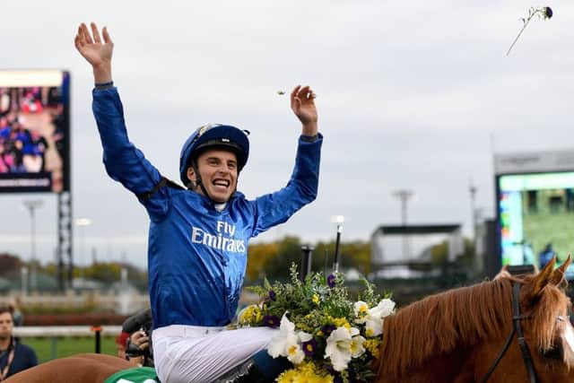 An ecstatic William Buick celebrates Line Of Duty's success in the Breeders' Cup.