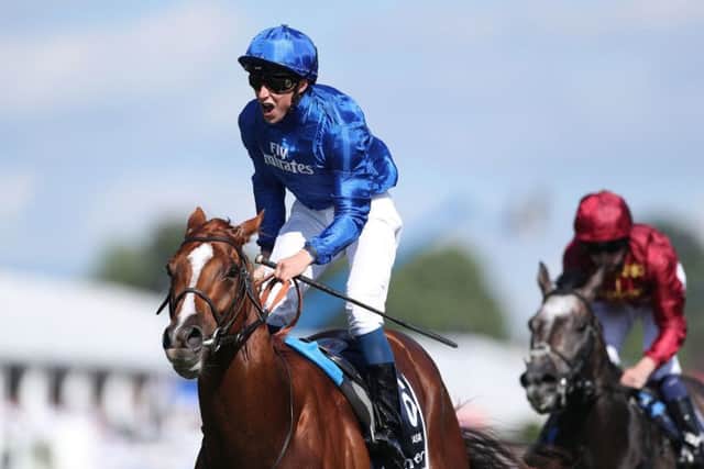William Buick celebrates his 2018 Epsom Derby win on Masar.