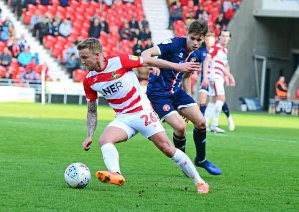 Doncaster Rovers veteran James Coppinger pictured in action against Walsall in March (Picture: Marie Caley).