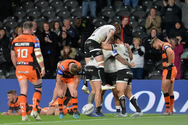 Castleford players are left disconsolate as Hull score another try. (PIC:BRUCE ROLLINSON)