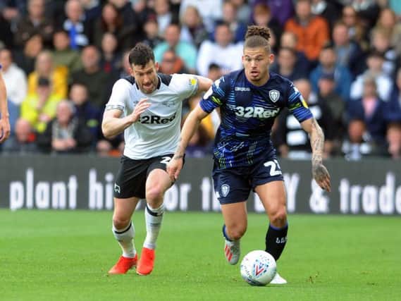 Kalvin Phillips takes the ball away from David Nugent as Leeds earn 1-0 win