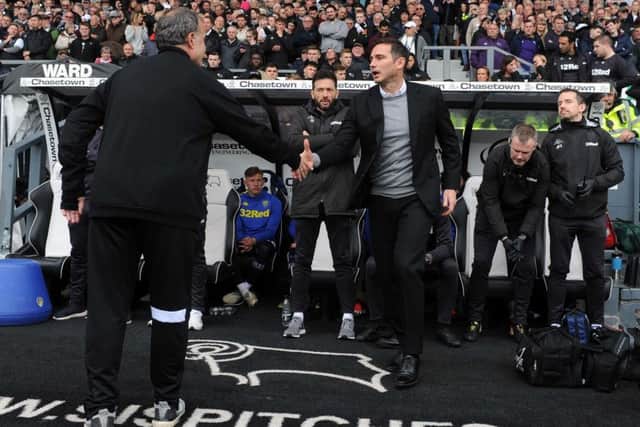 No love lost: Marcelo Bielsa and Frank Lampard shake hands before the game (Picture: Tony Johnson)
