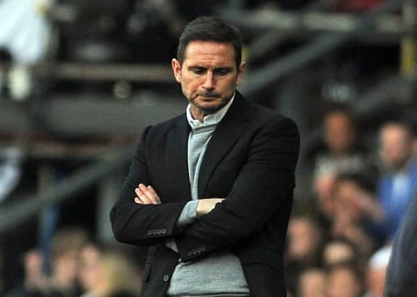 Feeling glum: Frank Lampard, the Derby County manager, looks dismayed as the game went against his side. (Picture: Tony Johnson)