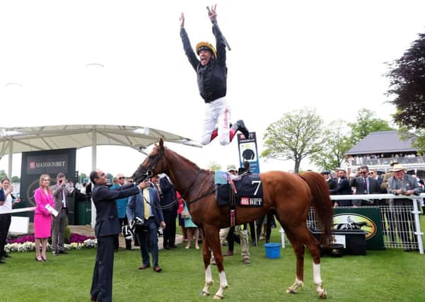 Jockey Frankie Dettori jumps from Stradivarius after winning the MansionBet Yorkshire Cup at the 2018 Dante Festival at York (Picture: Simon Cooper/PA Wire).