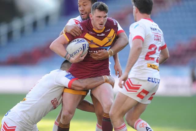 Huddersfield's Lee Gaskell on attack against St Helens (PIC: TONY JOHNSON)