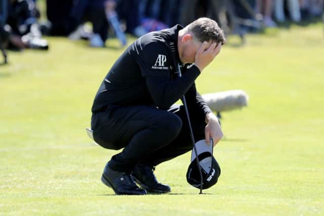 Matt Wallace looking dejected on 18th green at the British Masters. Picture: Richard Sellers/PA