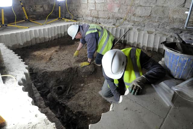 Archaeologists digging at York Minster, where a Roman road was discovered in 2012. Photo: Gerard Binks
