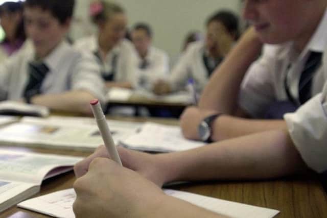 Education Secretary Damian Hinds has defended Britain's exams culture to test pupils.