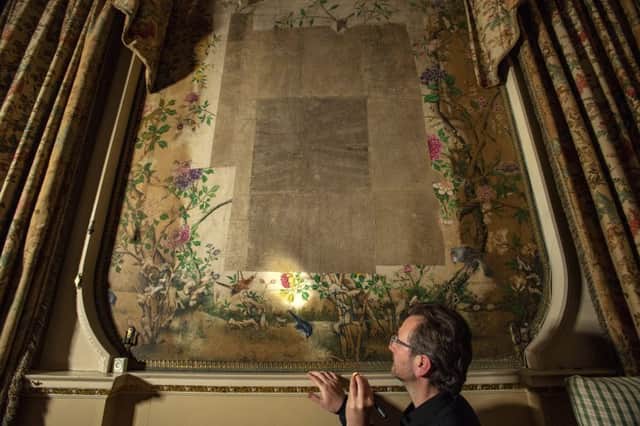 Simon McCormack, Project Curator at Nostell, looking at the wallpaper  where the mirror hung.

Picture: Bruce Rollinson