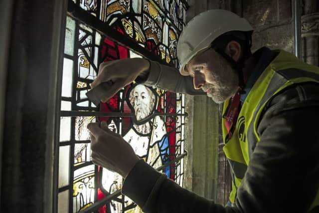 Conservation Manager Nick Teed removes a stained glass window during the first phase of work to protect 600-year-old stained glass windows, part of an 11 year, ??11m conservation and restoration project at York Minster.