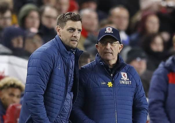 IN THE FRAME: Jonathan Woodgate, left, is among the front-runners to replace Middlesbrough manager Tony Pulis, right. Picture: PA
