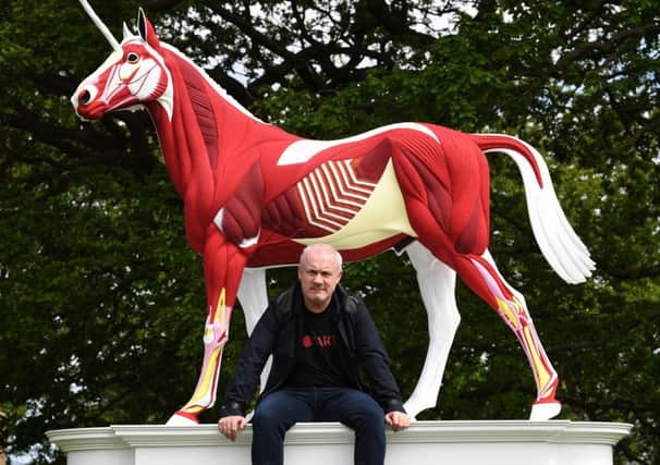 Damien Hirst at the Yorkshire Sculpture Park with his work, Myth.Picture by Jonathan Gawthorpe