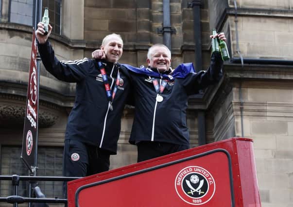 Dynamic duo: Assistant Alan Knill and manager Chris Wilder during the open-top bus parade. Picture: Simon Bellis/Sportimage