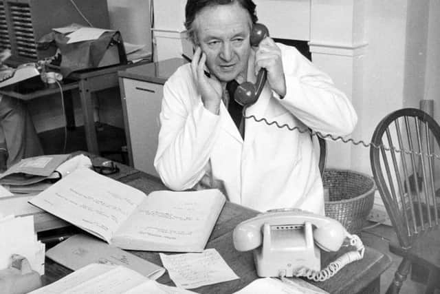 Veterinary surgeon James Herriot - Alf Wight - pictured in his office.