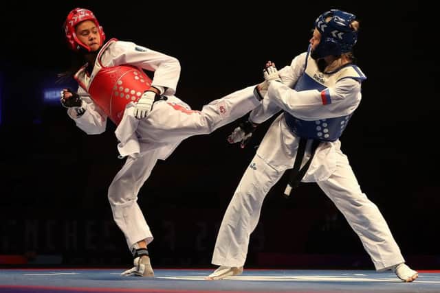 Great Britain's Aaliyah Powell (left) in action during her Women's -53kg semi final match against Russia's Tatiana Kudashova.