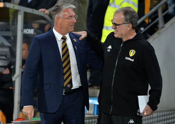 The futures of Hull Citys Nigel Adkins, left, and Leeds Uniteds Marcelo Bielsa have yet to be decided (Picture: Bruce Rollinson).