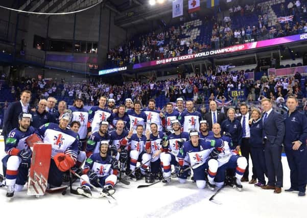 Great Britain's team and staff after retaining place in the top tier of the IIHF World Championships with a 4-3 overtime win against France. Picture: Dean Woolley.