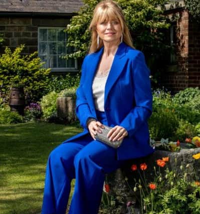 Christine Talbot wears blue trouser suit, from a selection at John Lewis & Partners. Picture by Charlotte Graham.