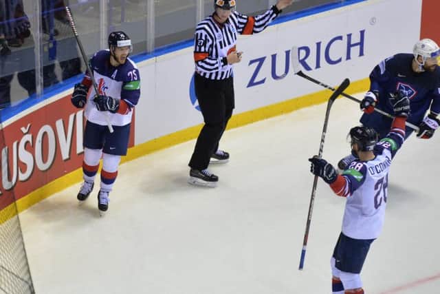 Robert Dowd celebrates his goal against France with Sheffield Steelers and GB team-mate Ben O'Connor. Picture: Dean Woolley.