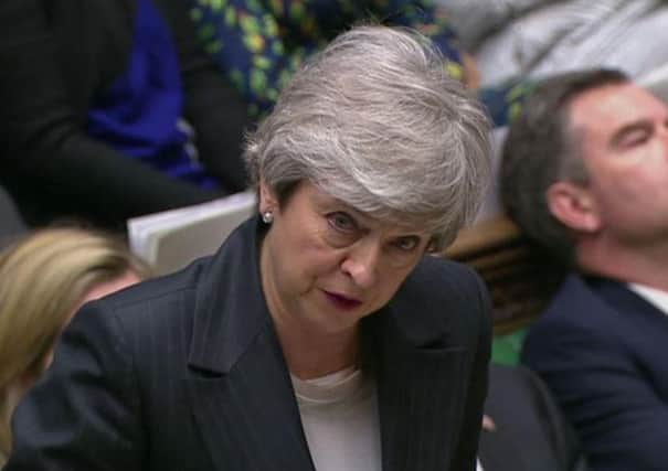 Prime Minister Theresa May speaks during Prime Minister's Questions in the House of Commons. Credit: House of Commons/PA