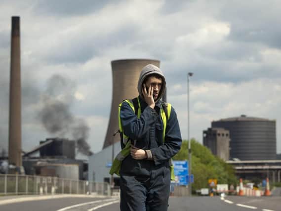 Workers leave the steelworks plant in Scunthorpe as owner British Steel goes into liquidation