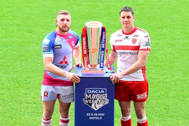 Hull KR's Joel Tomkins, right, with Salford's Jackson Hastings and the Super League trophy at Anfield. (SWPix)