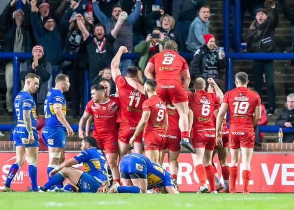 KILLER BLOW: London Broncos' players celebrate Will Lovell's try to seal the victory against Leeds Rhinos at Headingley back in March. Picture: Allan McKenzie/SWpix.com